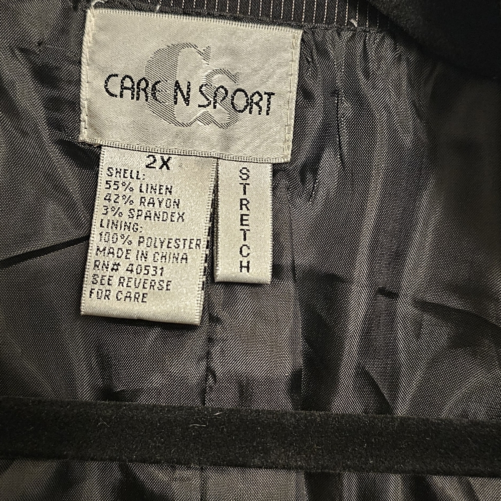Thin black casual jacket.